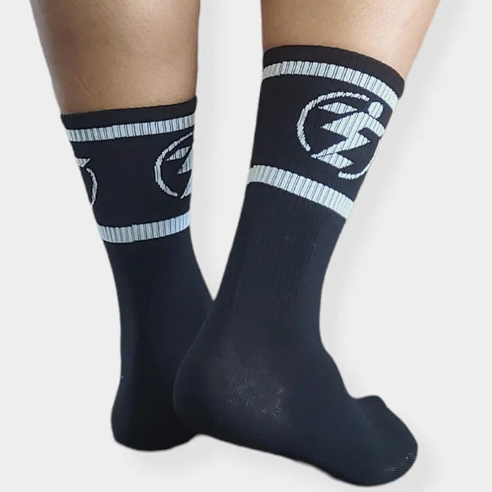 Black crew socks with white stripes and logo detail.