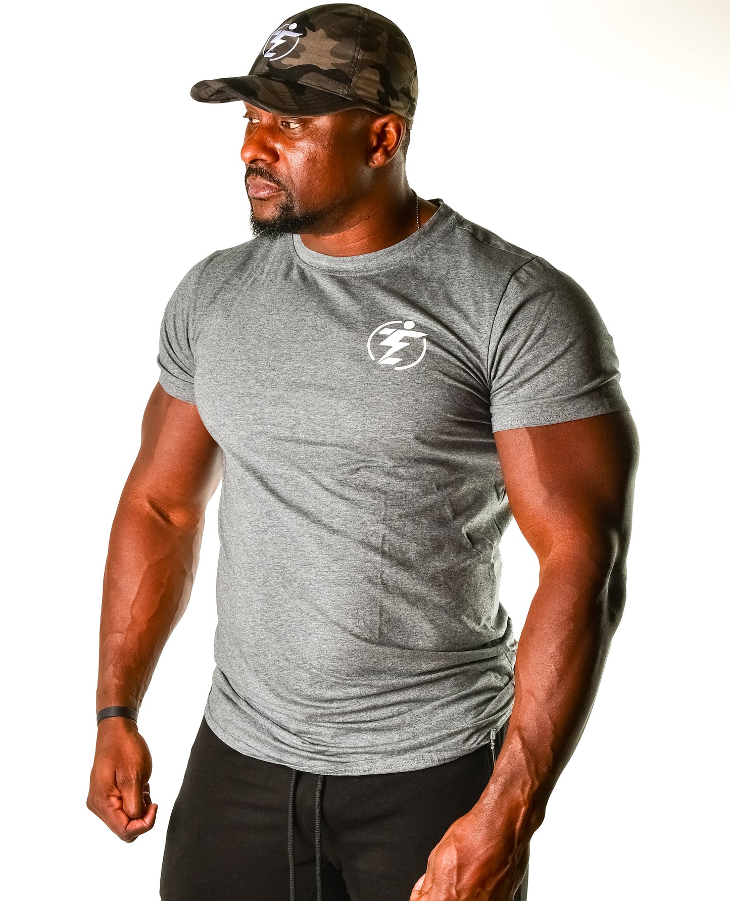 Man wearing grey athletic t-shirt and camo cap with logo. Athletic wear product shot.