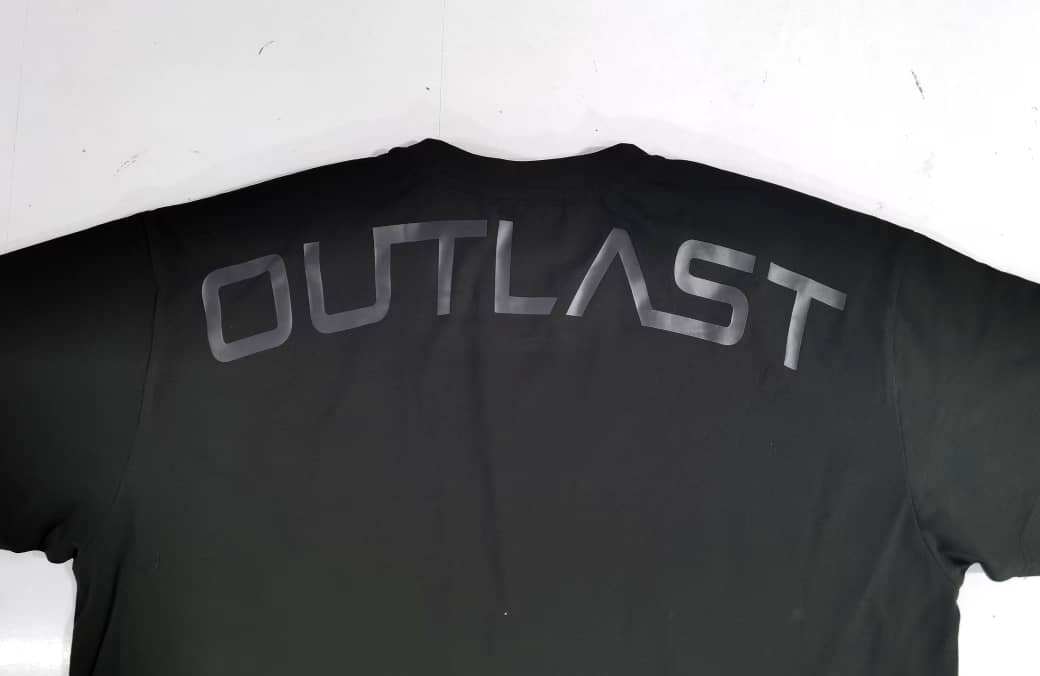 Black 'OUTLAST' t-shirt with grey outlined text on the upper back.